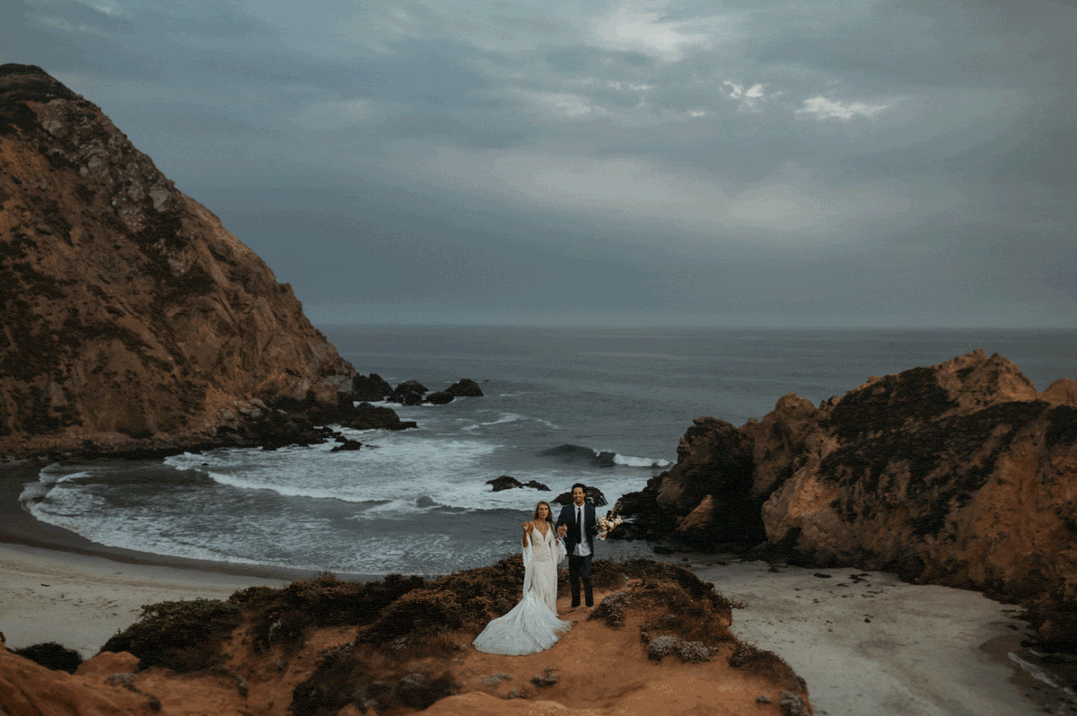 Bride and groom dance on a rock at their Big Sur beach elopement