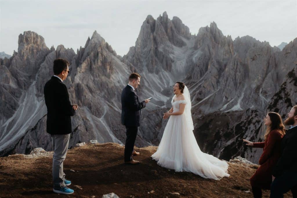 bride and groom crying happy tear on their elopement day on the mountains