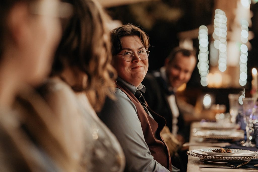 one of the newlyweds looking lovingly at their partner.