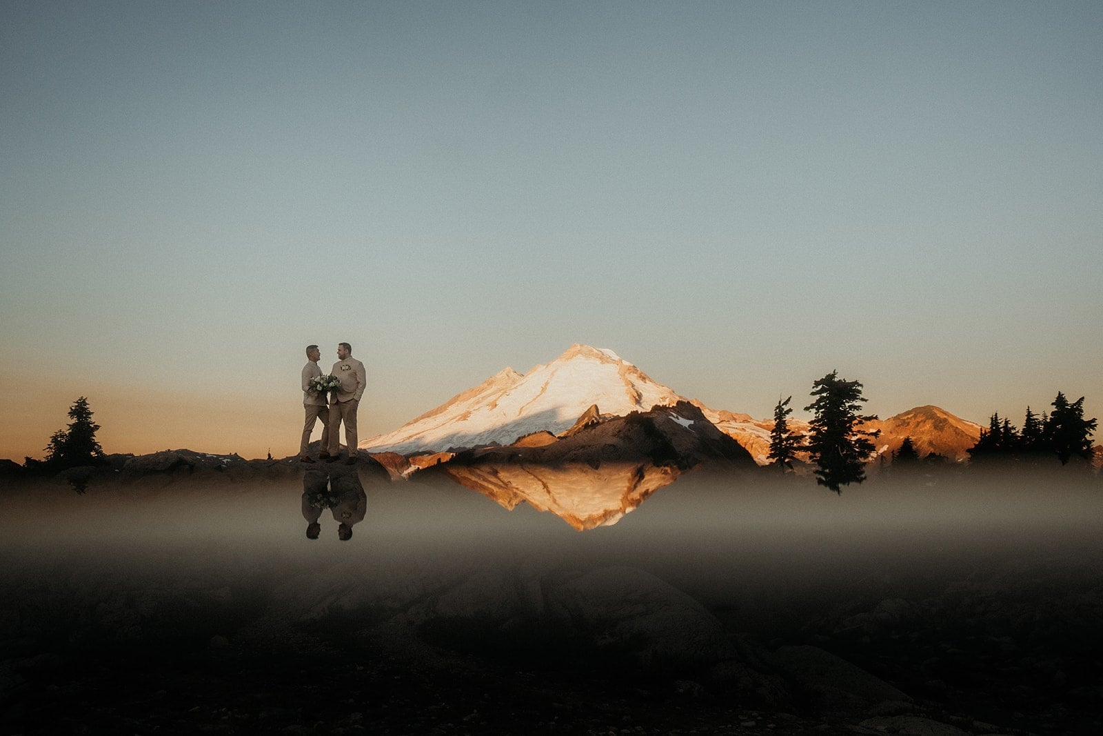 Grooms elope in the North Cascade mountains at sunrise.