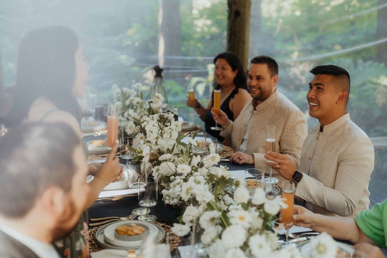 Guest gives a speech and toast at an elopement reception in Washington state.