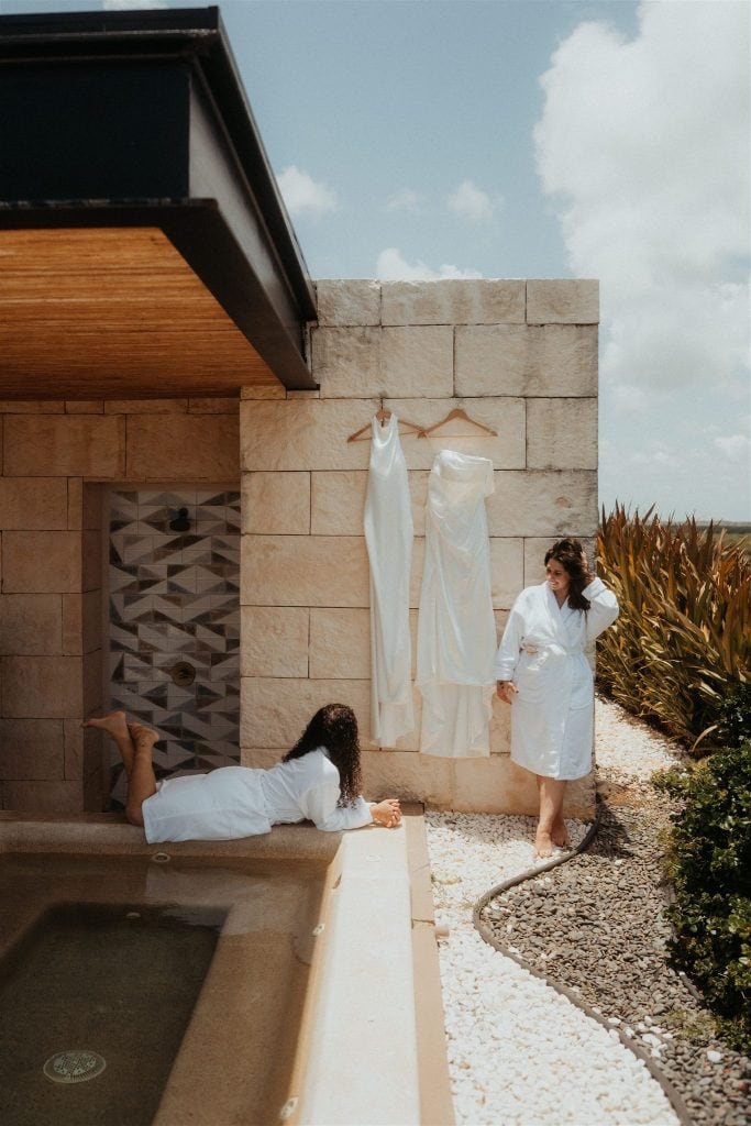 Intentional wedding tips. Two brides getting ready together on their wedding day