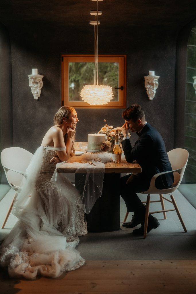 Intentional wedding tips: bride and groom enjoying private cake cutting