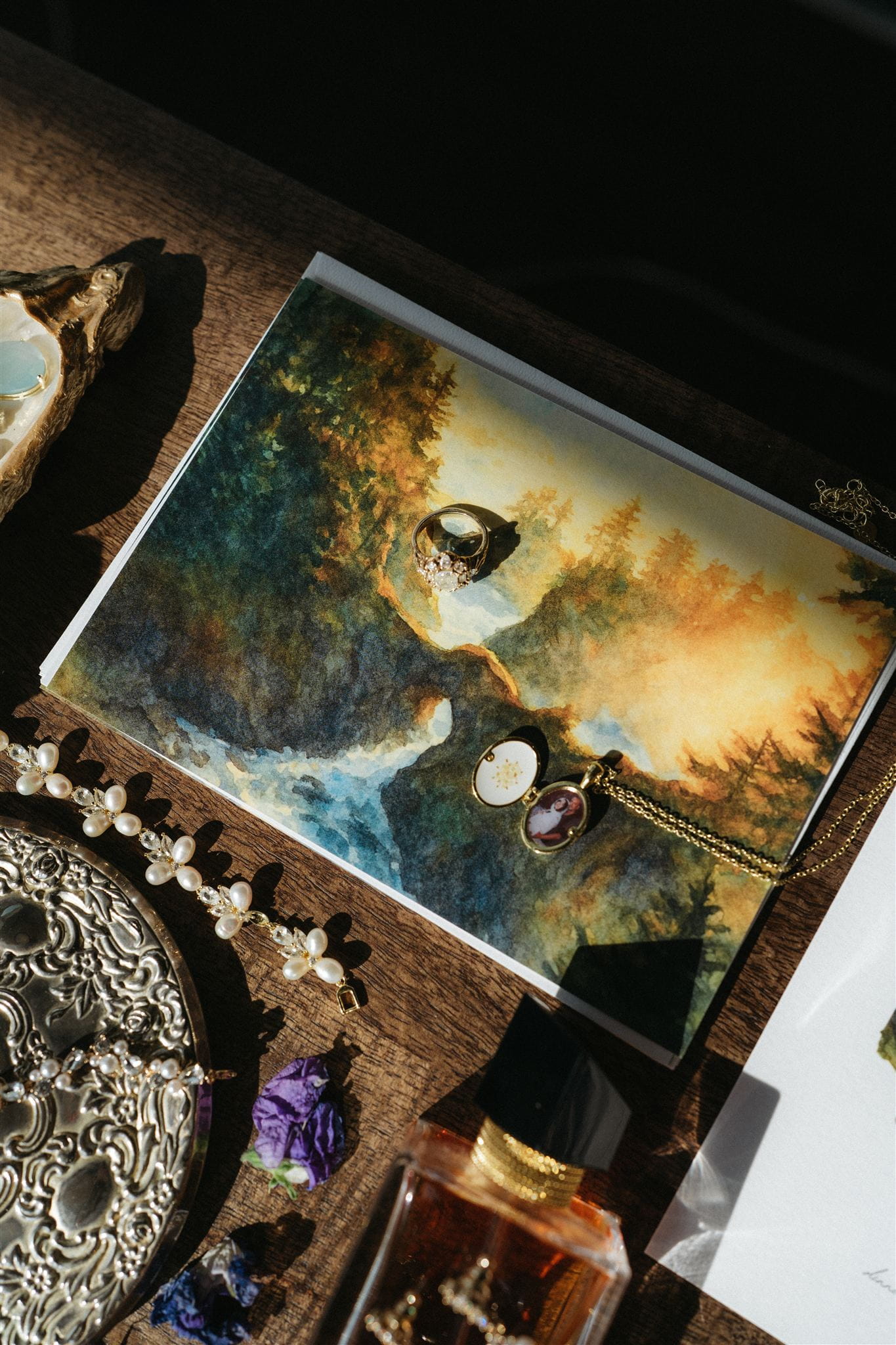 Hand painted wedding invitations of the Natural Bridges on the Oregon Coast.