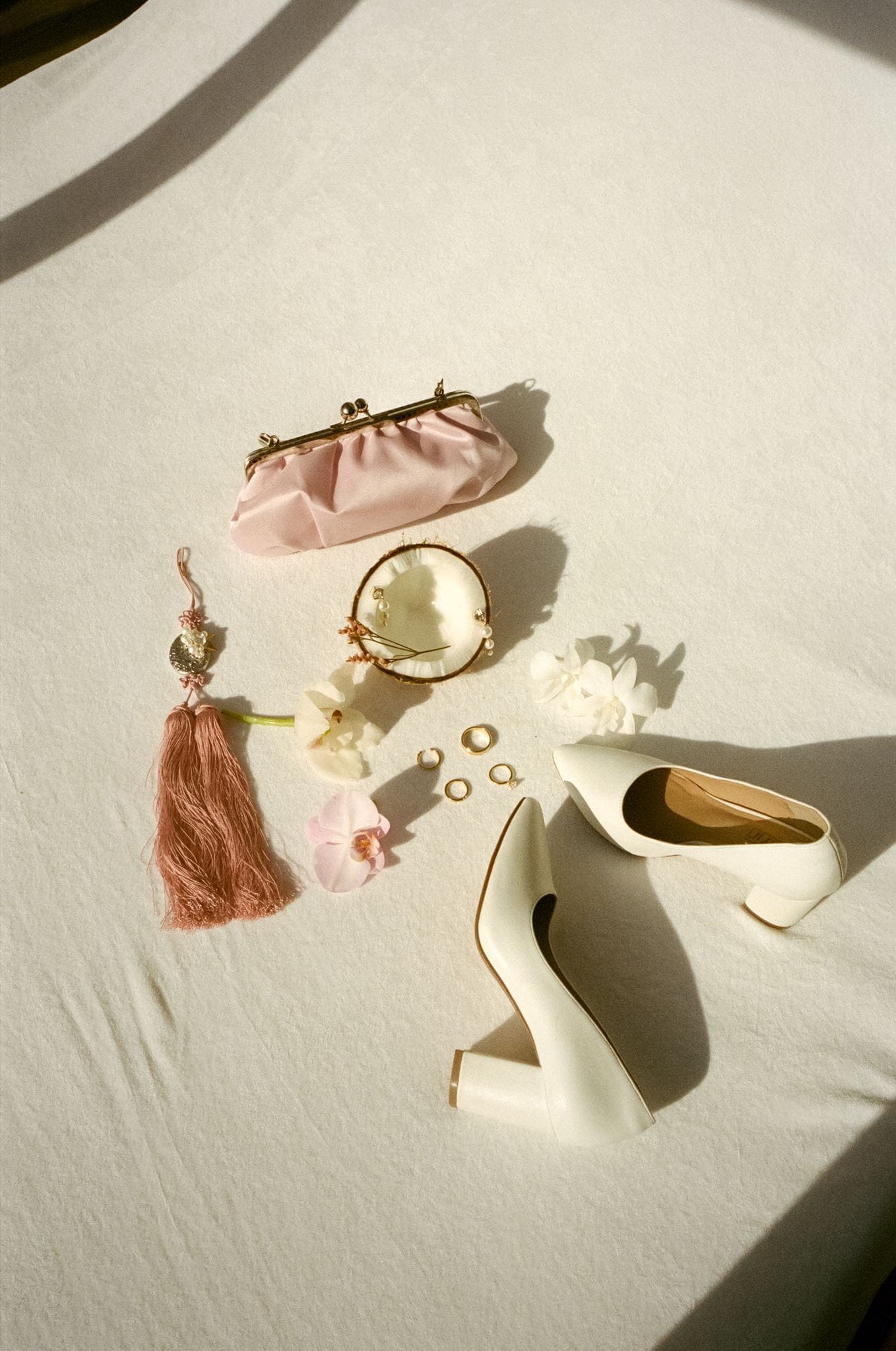 Pastel pink and white film wedding detail photos in Hawaii.