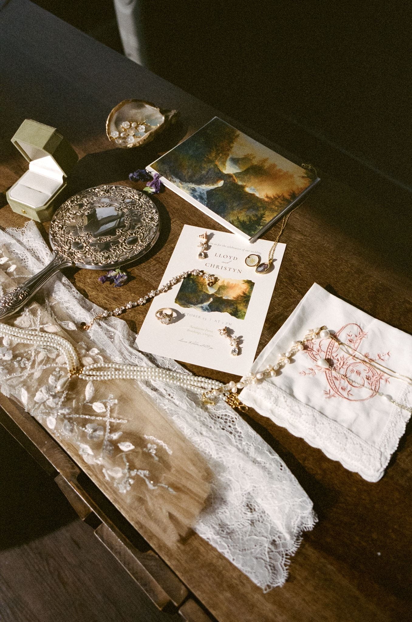 Oregon film wedding photo details with custom invitations, handkerchiefs, and accessories.
