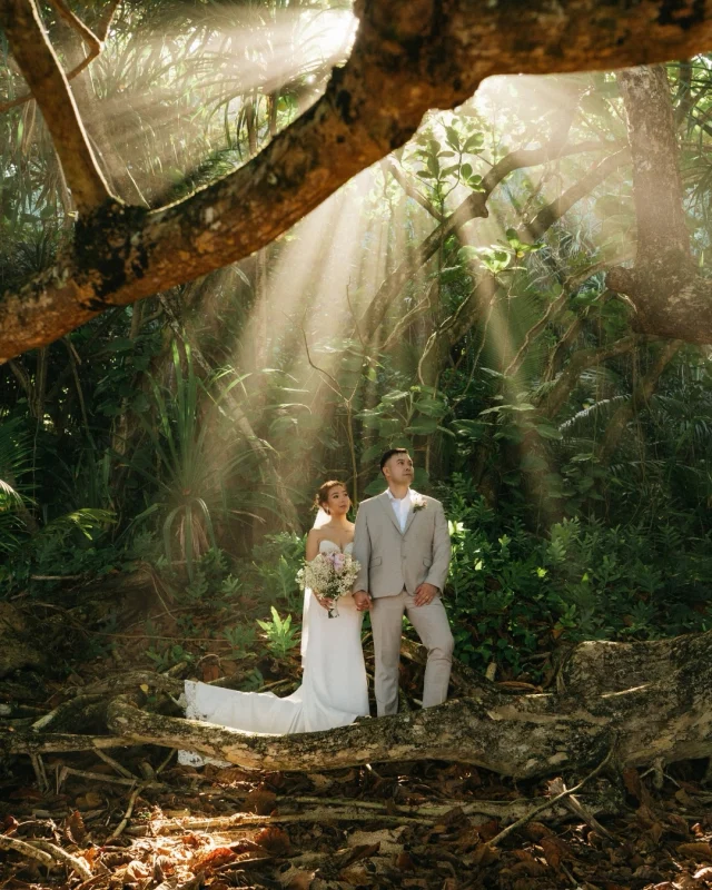 Not every elopement needs a long hike.

Some do.
Some don’t.

Some look like waking up before sunrise and walking barefoot onto a quiet beach.
Some look like staying at a beautiful hotel, sipping coffee slowly, and watching the light change without rushing anywhere.
Some look like wandering through a forest when the light unexpectedly breaks through the trees… and realizing this moment, right here, is enough.

There’s this narrative in the elopement world that adventure = effort.
That if you’re not hiking miles, climbing something, or chasing something hard to reach… you’re somehow doing it wrong.

But what if the real question is simpler than that?

What feels right for you?

Because an elopement isn’t about proving anything.
It’s not about how far you go.
It’s about how deeply you experience where you are.

These photos are from C and J’s 2-day elopement in Kauai.
When they first reached out, we didn’t know exactly what their days would look like. We only knew they wanted something that felt true… something the internet doesn’t show enough of.

The way they planned these two days with part quiet beach, part luxury, part exploring, part just being…reminded me of something I always come back to:

You don’t need to earn your experience.
You just need to be present for it.

And when you are…
you notice everything.
You notice how you are loved, and how to love.
You notice that your wedding experience isn’t anyone else’s but your own… and you deserve to have it your way.
You notice that life is actually quite simple and joy is more beautiful when it’s shared.

C and J, thank you for trusting me.
Thank you for treating my family to shave ice the day before your elopement.
Thank you for going all in.
Thank you for cheering me on when I picked up the coconut from your ceremony to re-purpose for your detail photos.
Thank you for constantly lifting me up with your words, even after we parted ways.

———
Film photos on Kodak Portra 400
Digitals on @sonyalpha and edited with @HDPresets

Keywords: Hawaii wedding, Kauai elopement

@1hotel.hanaleibay @agaliafilms @akuahawaiki @isleflowers @cassidyeliseartistry @pronovias @tangsbridal