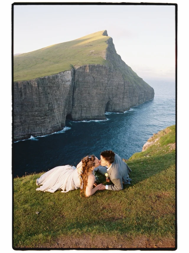 K + L had been to the Faroe Islands before.

I hadn’t.

So for two days, they took me back to some of their favorite places from their last trip…and somehow, we made completely new memories in all of them.

We said hi to every sheep and horse that would tolerate us 😂
We went to Tórshavn City Hall where they officially became wife and wife 🥹🏳️‍🌈
We pulled over on the side of the road for their first dance because in the Faroe Islands, apparently even the side of the road can look like that.

Then the next day, we hiked.
We crossed streams, got our boots soaked, climbed until there was nobody else around, and eventually found ourselves standing above the North Atlantic.

That was where K + L read their vows.

There’s something about photographing another queer love story that will always hit a little differently for me.

Maybe because so many of us grew up NEVER seeing stories like ours reach this part.

The wedding.
The marriage.
The growing old together.

And now I get to stand behind a camera and watch it happen in front of me.
I think that’s why these two days stayed with me.

K + L came back to the Faroe Islands thinking they already knew this place.

But now there’s a City Hall where they got married.
A random road where they had their first dance.
A few streams they crossed in wedding clothes.

And a cliff somewhere above the ocean where they promised each other forever.

Same place. Completely different memories.

Thank you K + L for showing me a place you already loved and trusting me to document the reason you’ll love it a little differently now. ❤️

A mixture of digitals and film @sonyalpha @kodak Ektacolor Pro 400

Florals: @akkuleya
HMUA: @margretmagnus
Dress: @dacigowns & @catherine__deane
Suit: @uncommonclosetllc
Airbnb: @hanusarstova

Destination Elopement Photographer, Queer Wedding Photographer, Film Wedding Photographer, Faroe Islands Elopement