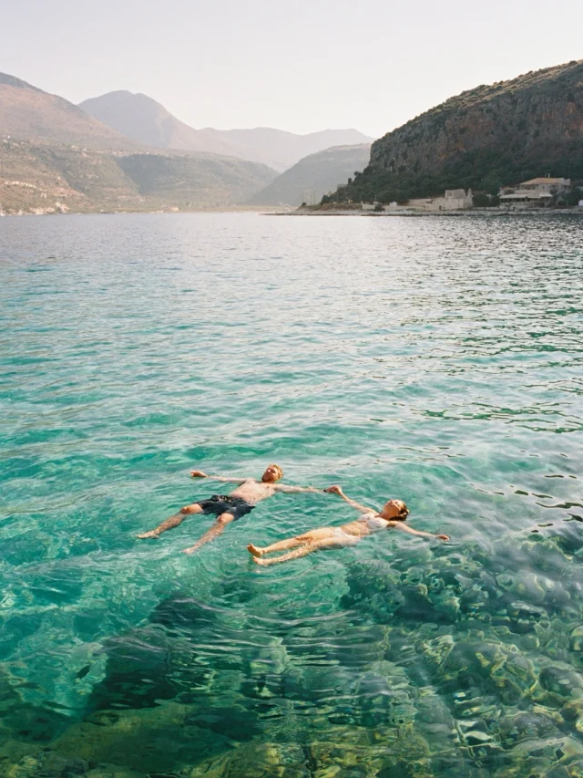 Part 2 of Christina and Tyler’s story. This time, Greece. 🇬🇷
 Social media can be so loud sometimes. The more I scroll, the more I feel like everyone is screaming at us about things we’re supposed to want, supposed to value, supposed to do.

You’re supposed to take the shot.
You’re supposed to kiss here.
You’re supposed to make the moment look like something.

But the more lives I’ve been invited into, the less certain I’ve become about the word “supposed to.”

When we planned this morning, Christina and Tyler wanted it to feel like one of the trips they’ve always taken together. And after years of following their adventures on Facebook, I knew exactly what they meant.

Wander somewhere new. Get in the water. Lay in the sun. Kiss when you want to. Jump in because it looks fun.

Except this time, they were exploring a new country for the first time as husband and wife.

So instead of thinking about all the photographs we were supposed to make, I followed them around Greece with a few rolls of film and let the morning become whatever it wanted to be.

Maybe that’s what I’m learning about life too.

The less I worry about what something is supposed to look like, the more I get to see what it actually is.

And this was only the morning.

Part 3 is what happened when we traded swimsuits for wedding clothes and watched the sun go down over Greece. 🤍 Stay tuned 😘

Digital photos on @sonyalpha
Film on @Kodak Ektacolor Pro 400
Photo: @henrysdiary
Content: @daybreakstudioscontent
Video: @daybreakstudiosco
Veil: @saragabrielveils from @tmodernbride

Greece Wedding Photographer, Greece Elopement Photographer, Destination Wedding, Film Wedding & Elopement Photographer